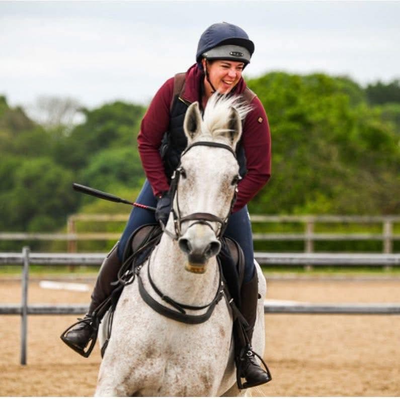 Rebecca riding her horse